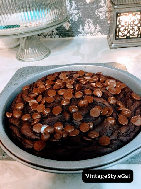 Baked brownie in round cake pan