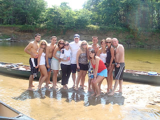 Canoeing happily - first pit stop