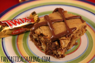 Nutella Twix Blondies | A chewy, soft dessert with Twix inside and Nutella on top!