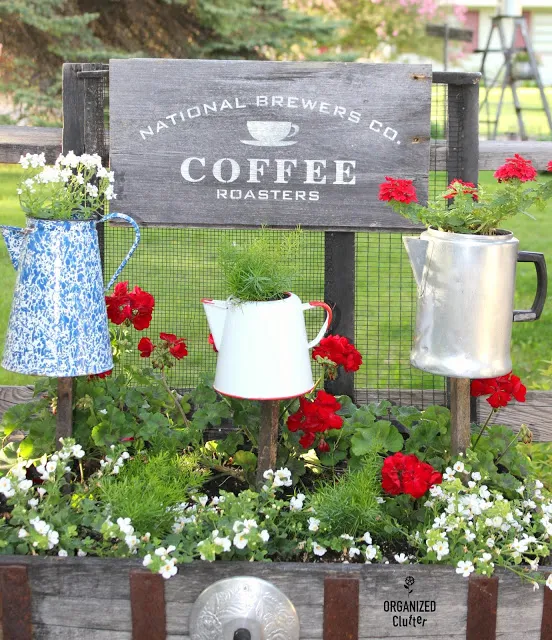 Coffee Pot Sign & Planters in a Junk Garden Vignette.