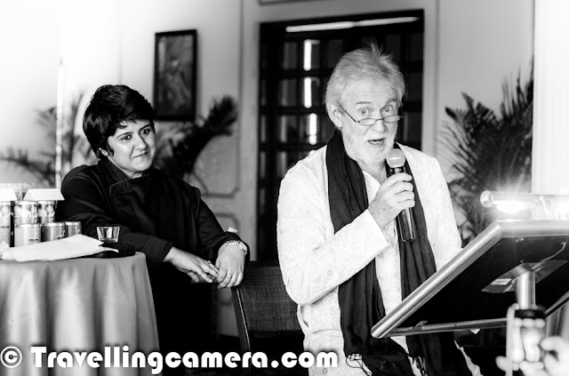 It was a beautiful evening when Tom Alter was presenting great poerty at Le Meridien, New Delhi. Travellingcamera team was also invited. This Photo Journey shares some moments from the same evening. We also shot some videos which are yet to be processed & shared. So let's enjoy these photographs and share your feedback/suggestions.Which version do you like ? The Black & White one or colored version? Above photograph shows two of my favorite people from the evening - Tom Alter & Shreen, both are awesome poets ! Above photograph shows the moment when Shreen asked him to guess her name. Actually she has done a play with Tom Alter and she gave different hints to guess the name & recall about their last meeting. I loved this interaction.This was first time I was seeing Tom Alter live in front of me. Three years back, I went to Alliance Francaise to watch Mirza Galib but cast was different, so missed seeing him.Tom Alter was here with the Tea Expert Anamika Singh/ With amazing poetry by Tom Alter, we had amazing Anandini Tea at Le Meridien, Delhi.Tom had a fabulous entry into the hall where everyone was waiting eagerly to see him & listen to his poetry. He also presented poems written by other famous poets !!His poems were quite apt for the whole environment and theme of the evening !Tom Alter is native of Mussoorie and the son of American Christian missionaries of English and Scottish ancestry and has lived for years in Mumbai and the Himalayan hill station of Landour. His father was born in Sialkot, now in Pakistan. His elder sister Martha Chen has a PhD in Sanskrit and his brother John is a poet and a teacher. He studied at the Film and Television Institute of India. His major inspiration to enter films was Rajesh Khanna.During the evening he presented different poems along with appropriate songs. It was quite apt from his impressions that he quite enjoys poems & music. His presence really changes the whole environment of the hall full of media, Bloggers & tea lovers etc.Check out more about Tom Alter @ http://en.wikipedia.org/wiki/Tom_Alter