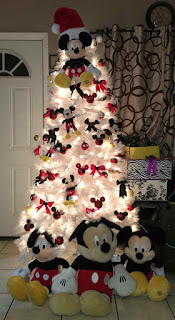 white christmas tree decorated with disney toys