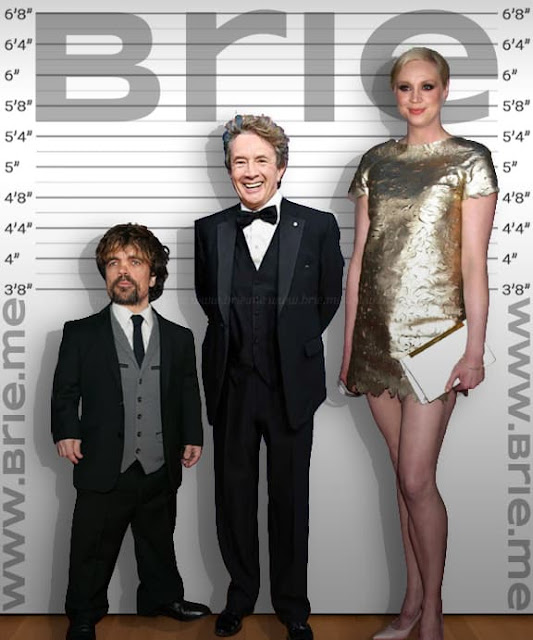 Martin Short standing with Peter Dinklage and Gwendoline christie