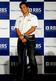 Smart looking Sachin Tendulkar smiling for cameras endorsing for RBS