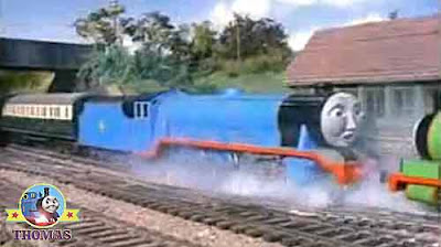 Percy the train engine and big Gordon express stopped with the metal buffer a few inches from his