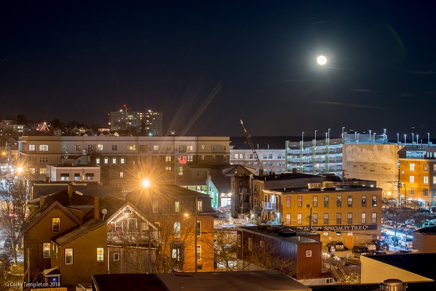 Portland, Maine USA December 2016 photo by Corey Templeton of moon rising above India Street Neighborhood in the winter.