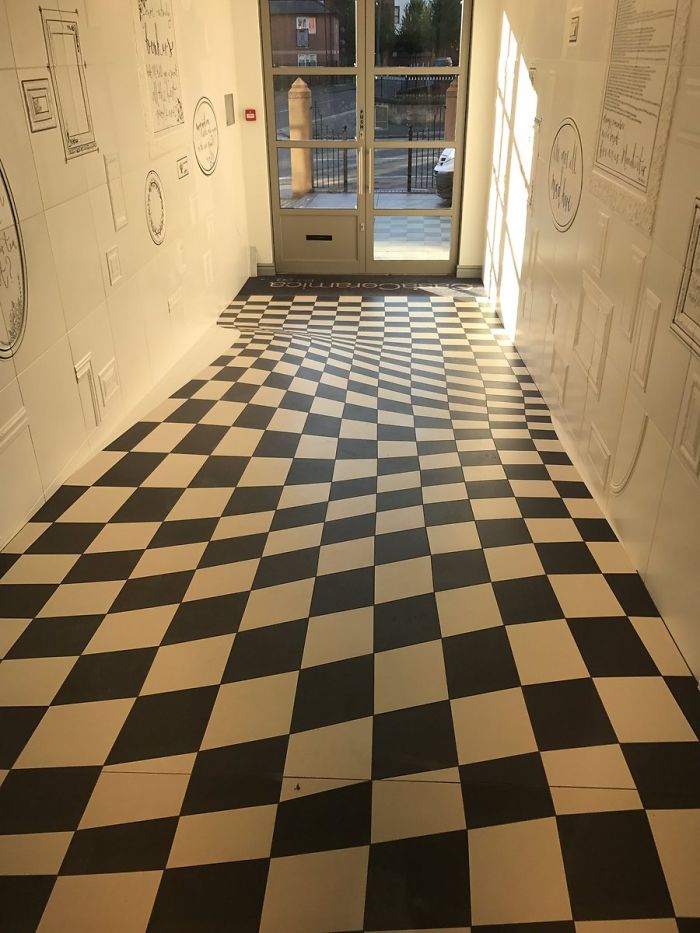 Genius Optical Illusion On The Floor Prevents People From Running In The Hallway