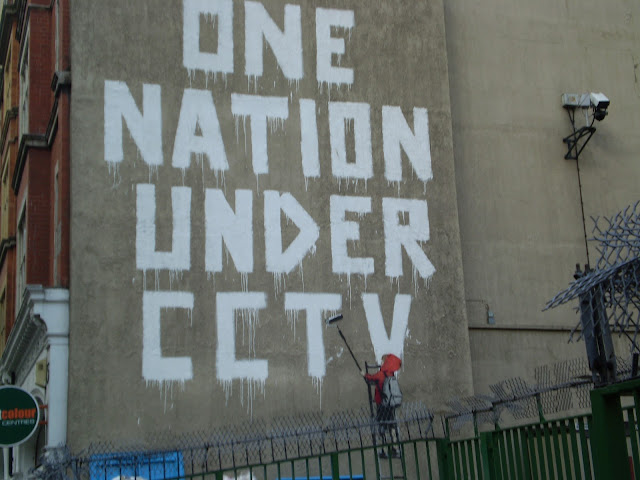 Banksy graffiti "one nation under cctv"