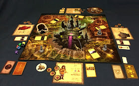 The board laid out with the various components arranged around it to display a game in progress.
