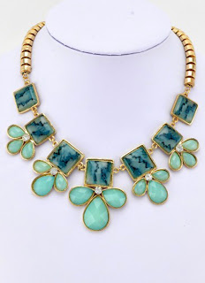 http://www.myvintage.co.uk/retro-necklaces/retro-goldtone-jasper-leaf-square-rhinestone-necklace.html