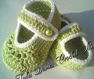 http://www.craftsy.com/pattern/crocheting/clothing/milena-baby-shoes/19395?SSAID=780943&SSAID=924082