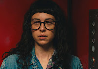 woman standing in an elevator