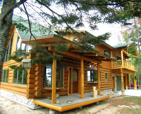 log home with green touch