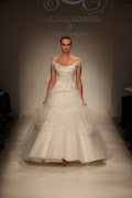 This dress is the original Disney Belle Dress from Alfred Angelo.