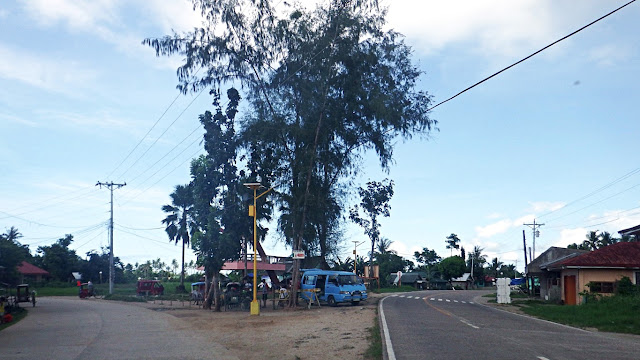 the western "Uswag Pambujan" Marker cum waiting shed and bus stop