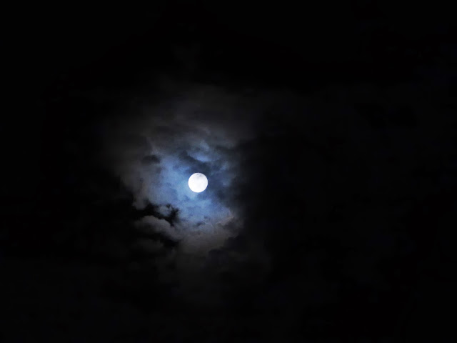 Moon in sky cloudy