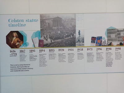 Colston statue timeline, starting with Colston's dates of 1636-1721. The following is a summary of the already-brief information provided for each date. 1867 - the Colston Hall opens, named after the street it is on. 1893 - wealthy businessman James Arrowsmith proposes a Colston statue. 1894 - statue committee established. 1895 - statue is erected. 1920 - Rev Wilkins publishes a history of Colston highlighting ihs role in the transatlantic trade and his political and religious prejudices. 1934 - A guide to Bristol is published on the centenary of the Slave Emancipation Act that leaves out Colston entirely. 1958 - the statue is moved slightly. 1973 - Derek Robinson publishes A Shocking History of Bristol that highlight's Colston's involvement in the slave trade and questions his ongoing celebration by the city.