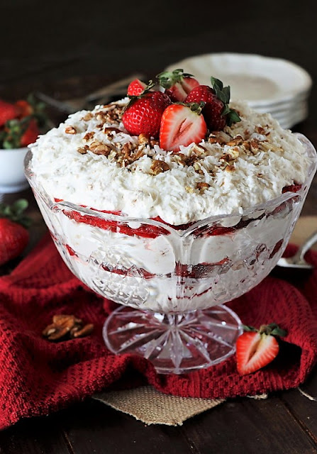  amongst scrumptiously creamy layers of angel nutrient cake Southern Strawberry-Coconut Punch Bowl Cake