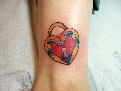 Kristen's Key and Heart Lock Tattoo on arm Red heart lock with violet