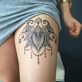 Unique Girly Thigh Tattoos