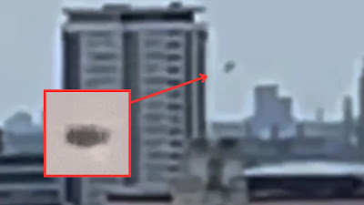 A rendering of the UFO using stealth tech over London.