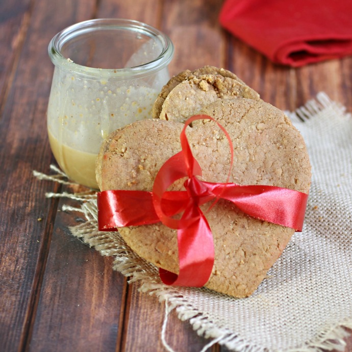 Recipe for heart shaped peanut butter banana ice cream sandwiches with peanut butter caramel.