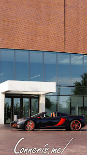 McLaren 12C in front of building