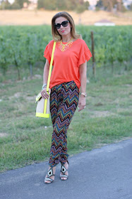 orange t-shirt, swaychic chevron pants, neon bucket bag, fashion and cookies