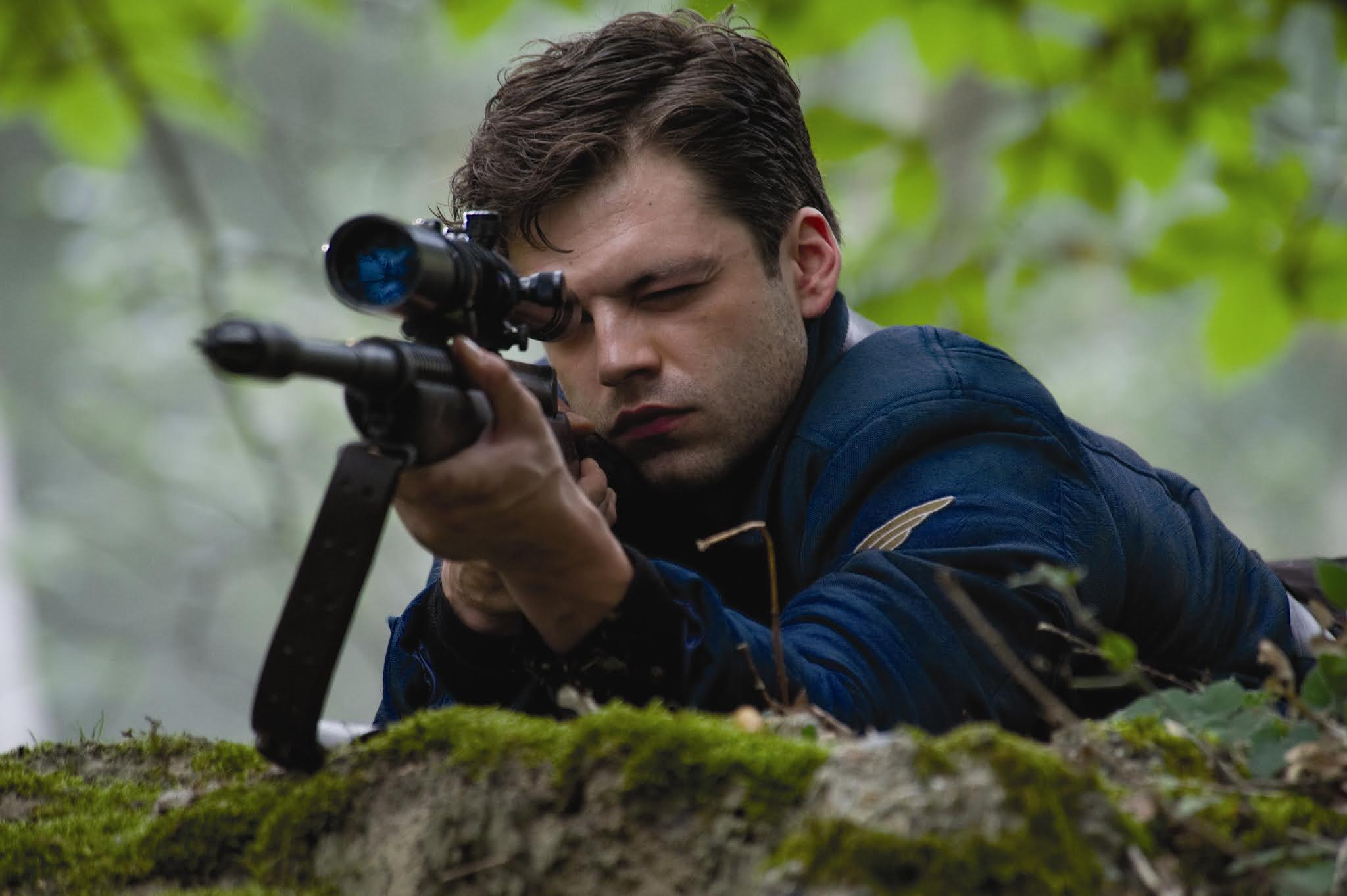 Bucky Barnes/winter soldiers  takes aim with his sniper rifle