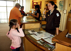 Tessa recited the Junior Ranger pledge at Walnut Canyon National Monument. Part of the pledge was to promise to respect and tell others about the park. She repeated a version of this pledge at every park.