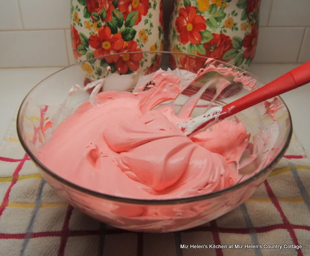 Raspberry Poke Cake With Marshmallow Frosting