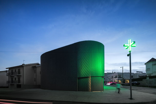 Picture of green light on the modern pharmacy building
