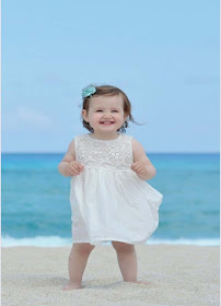 white-baby-girl-in-white-frock