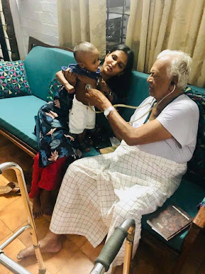 Dr. K. C. Mammen with a grandniece