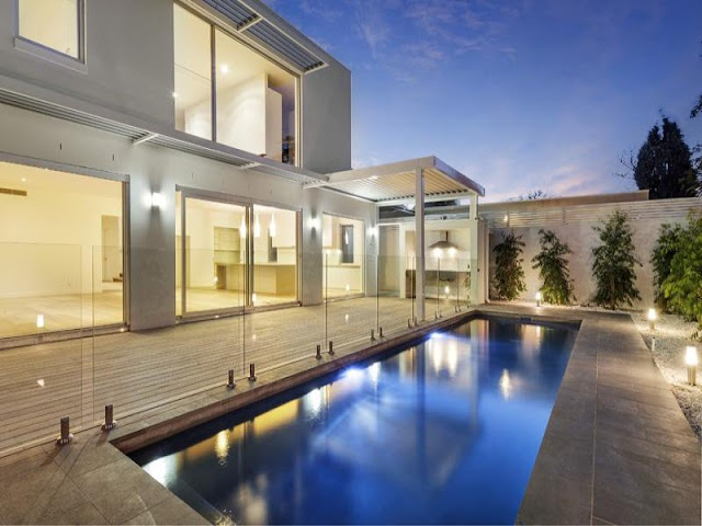 Photo of pool area in the backyard of modern residence in Australia