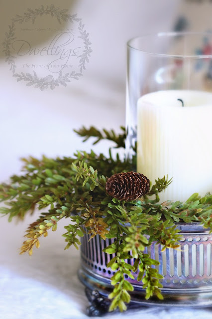Silver dish and pine cone wreath turned candle holder for the guest room.