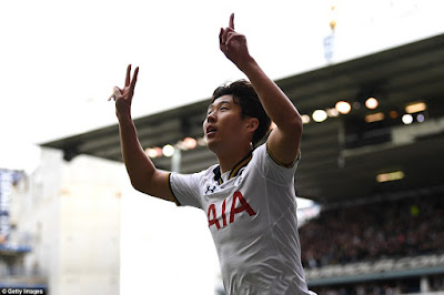 The South Korean ace points to the skies following his deft near-post finish to put Spurs two goals ahead
