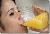 woman drinking juice