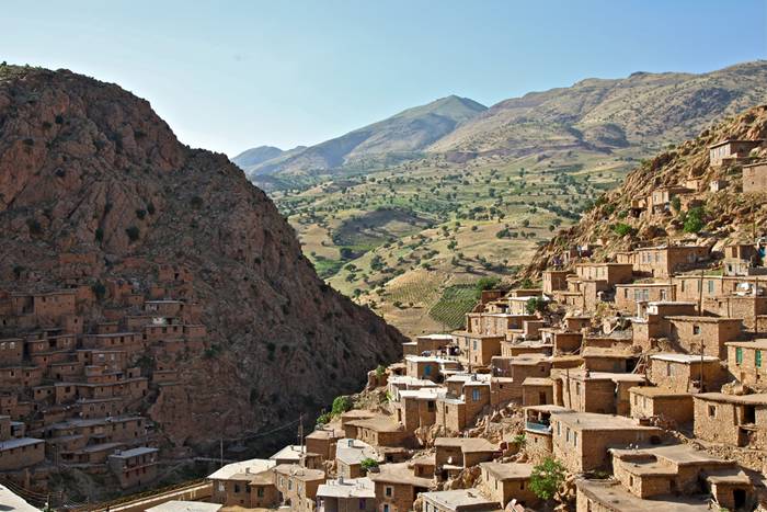 Palangan (meaning leopards in Persian) is a village located 47 kilometers north-west of Kamyaran in Iran's Kurdestan province. This village is spread over both sides of a valley. All of the houses are made of stone and like a staircase they are in a continuous pattern, i.e. the roof of one house is the yard of another house. This village is one of the most beautiful villages of the province not only because of its unique architecture, but also because of its beautiful nature. It is located beside a river which flows into the Sirwan River. This area was one of the important regions of Kurdistan from Saljooqi period on and Palangan Castle which is next to the village over a mountain bears witness to this claim. (source: Islamic Republic of Iran's Minister of Interior)