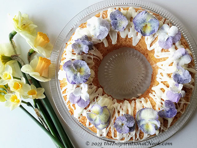 Cointreau Daffodil cake with sugared pansies, sugar flower cake topper