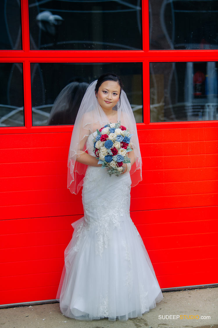 Ann Arbor Wedding Portrait Photography in front of Firehouse Fire truck by SudeepStudio.com Michigan Wedding Photographer