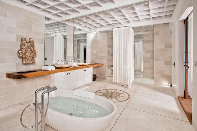 Picture of modern tropical bathroom with white marble