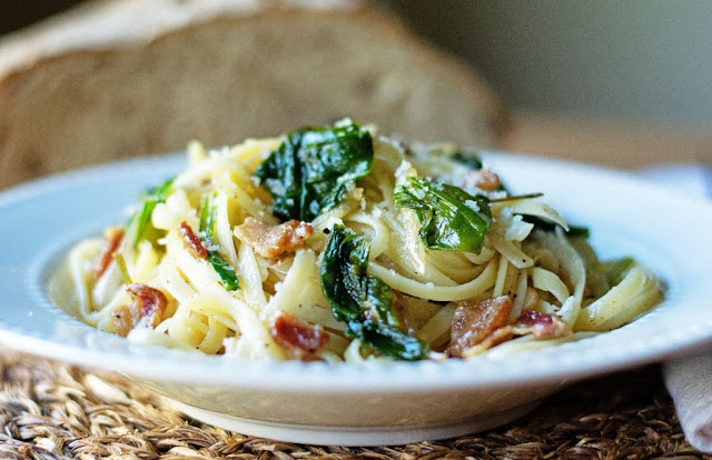 A white plate of easy ramp carbonara.