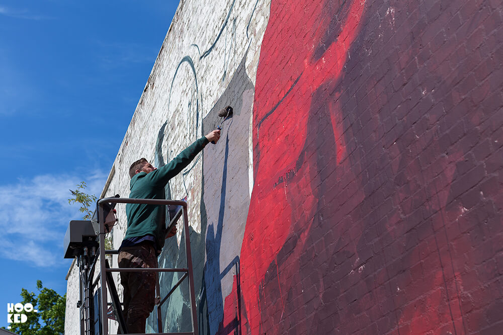 Irish artist Conor Harrington at work on his Walthamstow Street Art Mural