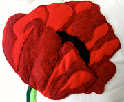 http://www.etsy.com/listing/71820744/handmadeperfectpoppyinredand (poppy )