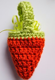 http://www.ravelry.com/patterns/library/carrot-treat-bag