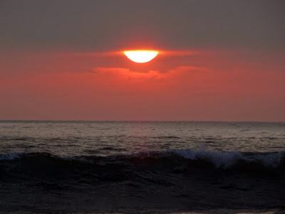 Carlsbad Beach Sunset despite Heavy Cloud Cover by Stacey Kuhns