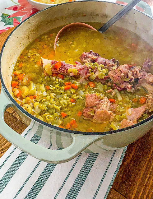 Hearty Split Pea Soup is made with a meaty hambone, generous carrots, onions, and celery, yielding a flavorful broth.  It is easy to make on the stovetop, but I have added a slow cooker and instant pot option.