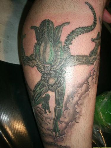 Alien Tattoos Designs Pictures 3D Alien Tattoo on Biceps