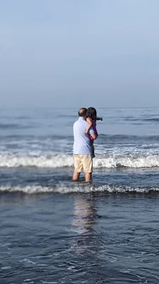 Daughter-grandfather enjoying in sea